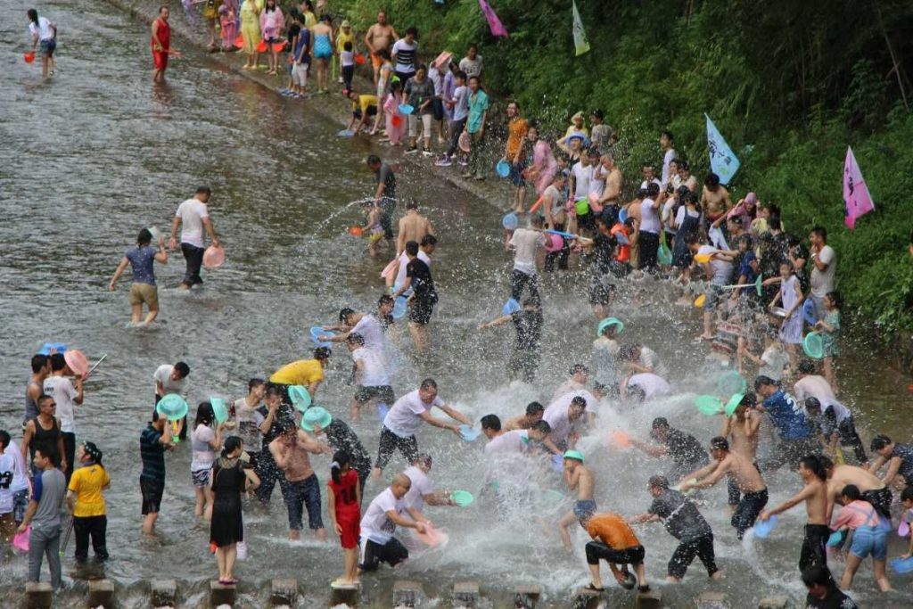 Local people enjoy the Songkran Festival in Thailand